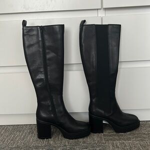 These cute black boots never worn !